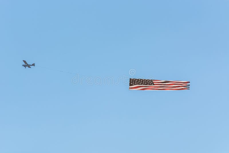 Engine airplane with banner towing