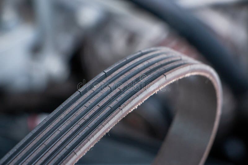 Engine Belt Broken from Period of Use Time To Change Stock Image