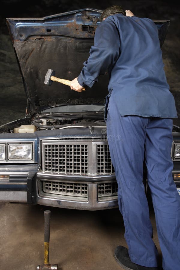 Hammer on a car engine stock photo. Image of hammer, wires 26108534
