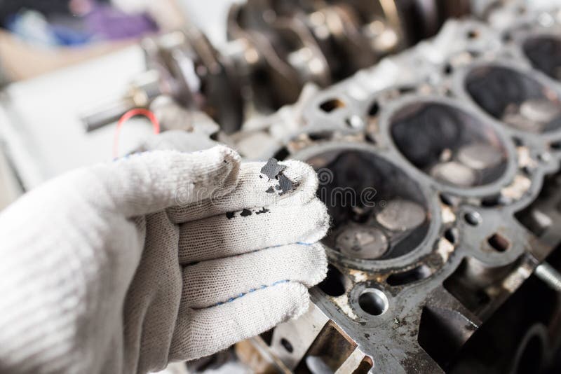 Engine Valve Car Maintenance. a Deposit on a Piston, a Large Run a Long