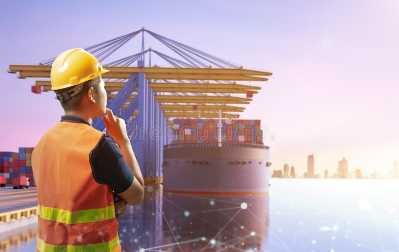 Engineer or asian worker work at container terminal port stock photos
