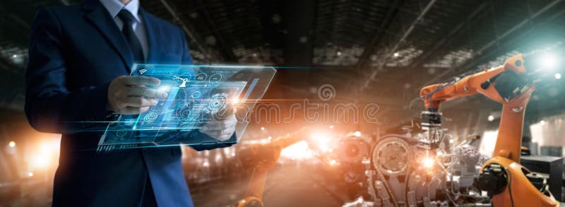 Engineer check and control welding robotics automatic arms machine in factory automotive industrial with monitoring system