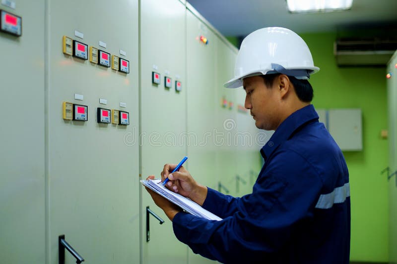Engineer Checking the Electrical System Stock Photo Image of