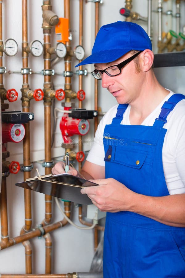 Heating Engineer in a Boiler Room for Heating Stock Image Image of