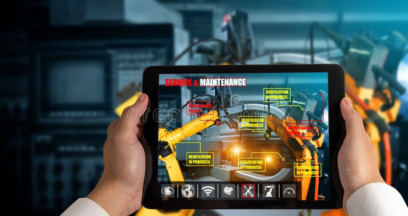 Engineer controls robotic arms by augmented reality industry technology royalty free stock images