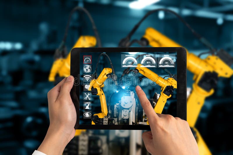 Engineer controls robotic arms by augmented reality industry technology application software. Smart robot machine in future factory working in concept of Industry 4. 0 or 4th industrial revolution.