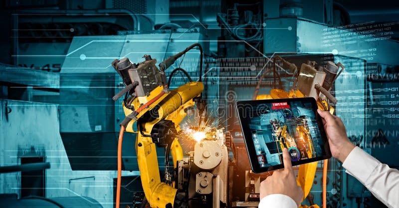 Engineer controls robotic arms by augmented reality industry technology royalty free stock photography