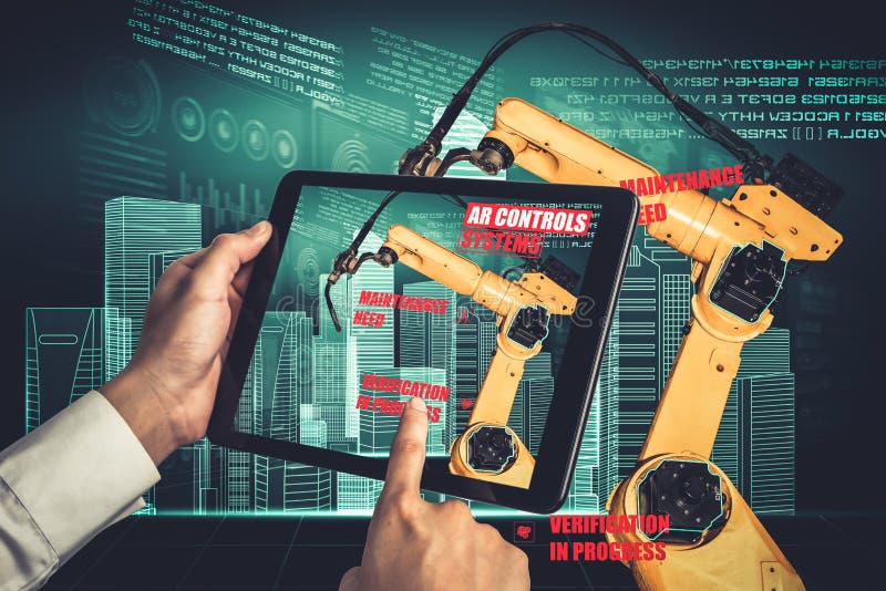 Engineer controls robotic arms by augmented reality industry technology stock images