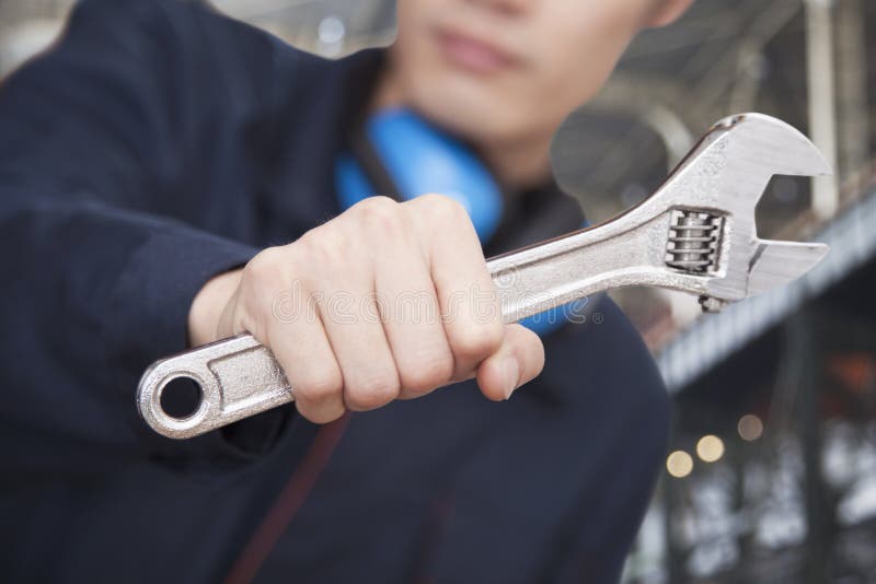 Engineer Holding a Wrench, Closeup on Wrench Stock Image Image of
