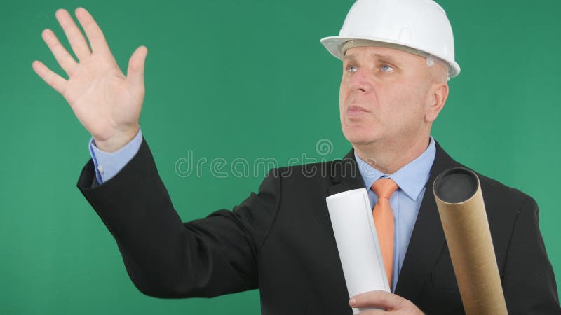 Engineer Image With Plans and Projects in Hand Talking And Gesturing stock image Engineer Image With Plans and Projects in Hand Talking And Gesturing stock image