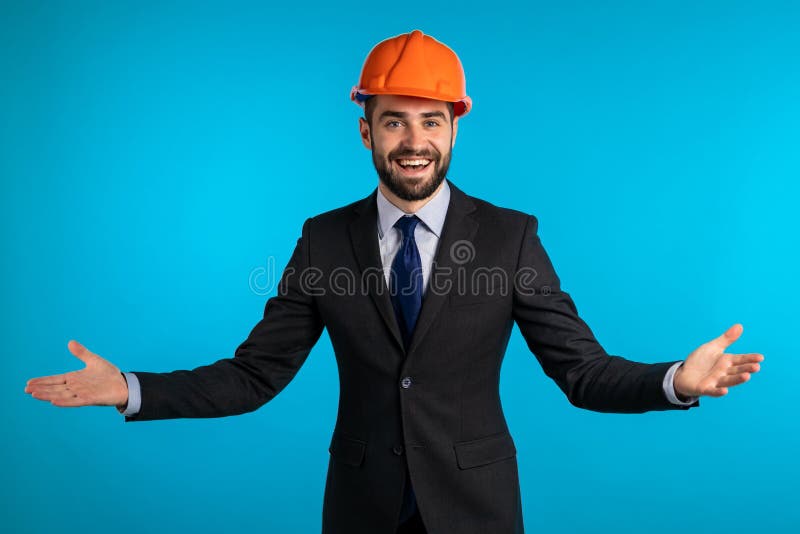 Engineer Man with beard in corporative suit over blue background. stock images Engineer Man with beard in corporative suit over blue background. stock images