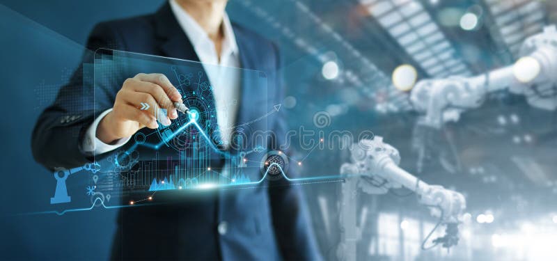 Engineer manager analyzing and control automation robot arms machine on software modern virtual interface data real time in royalty free stock image.