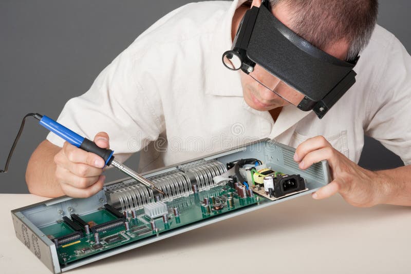 Technician Repairing Computer Hardware In The Lab Stock Photo Image