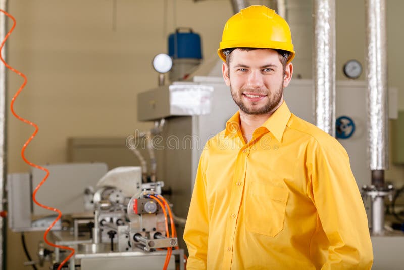 Engineer working in factory stock photo