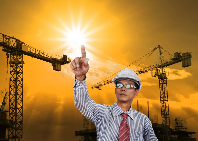 Engineering man working in construction site royalty free stock photography