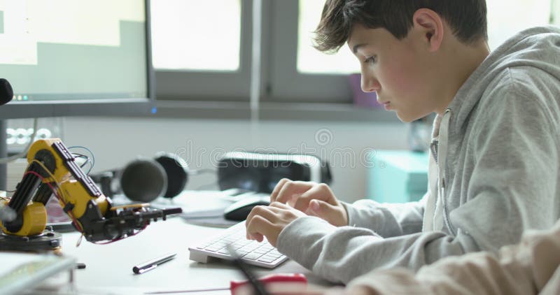 Engineering students printing prototypes in the lab stock video footage