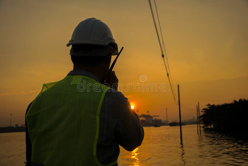 Engineering Supervisor concept. Equipment that engineers need to use for safety and for communication,  to contact work orders. walkie-talkie radio is a communication tool