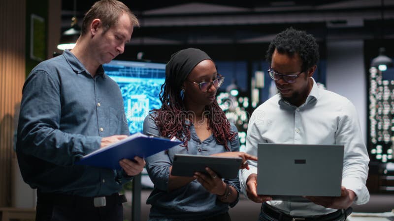 Engineering team in office developing machine learning algorithms stock footage