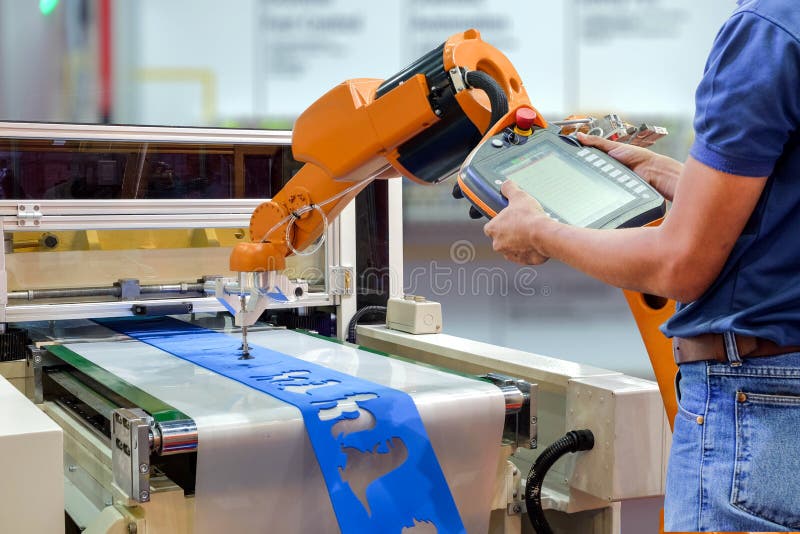 Engineers use a wireless remote control robot stock photos Engineers use a wireless remote control robot stock photos