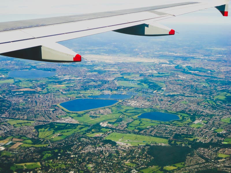 Windows Seat View Over the English Countryside during a Nice-London Windows Seat View Over the English Countryside during a Nice-London