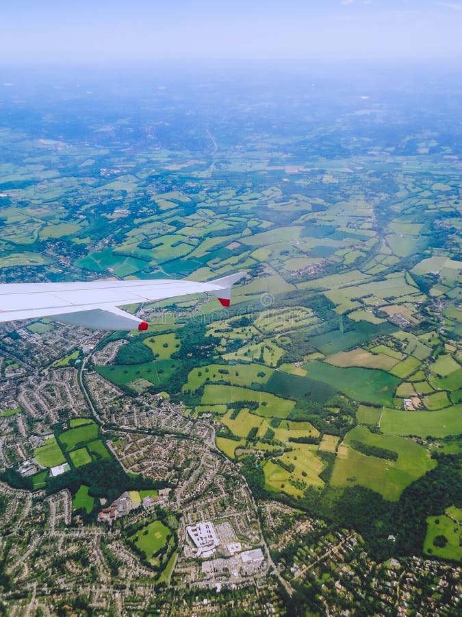 Windows Seat View Over the English Countryside during a Nice-London Windows Seat View Over the English Countryside during a Nice-London