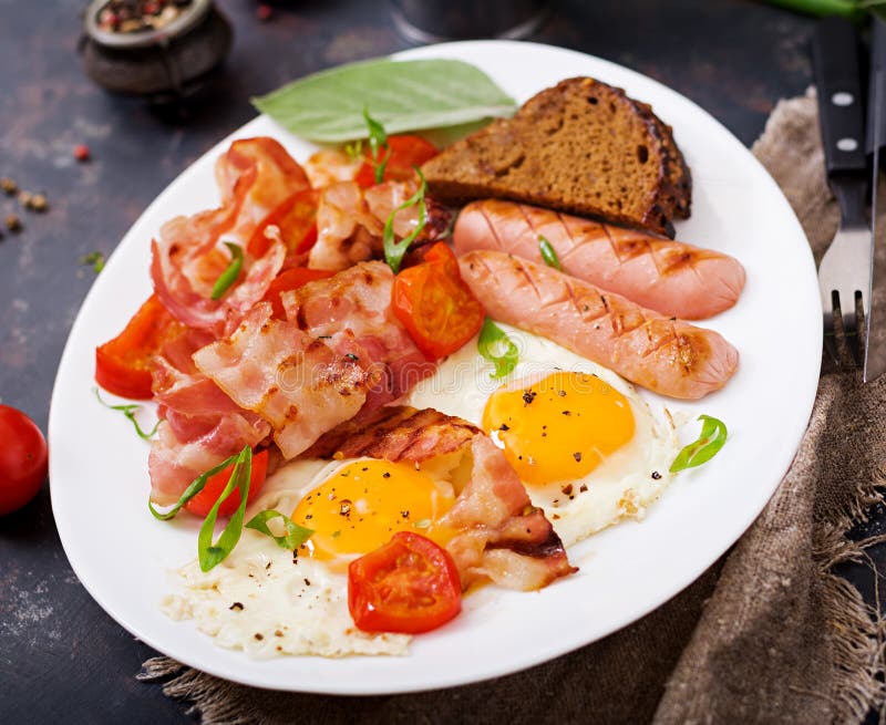 English Breakfast - Fried Egg, Sausage, Tomatoes, Bacon Stock Image ...