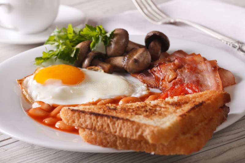 English Breakfast Fried Eggs with Bacon and Vegetables Stock Photo