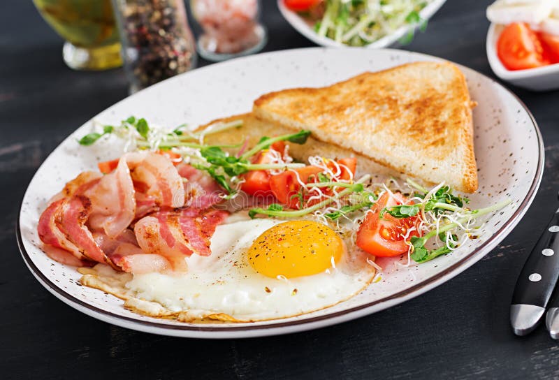 English Breakfast - Toast, Egg, Bacon and Tomatoes and Microgreens ...