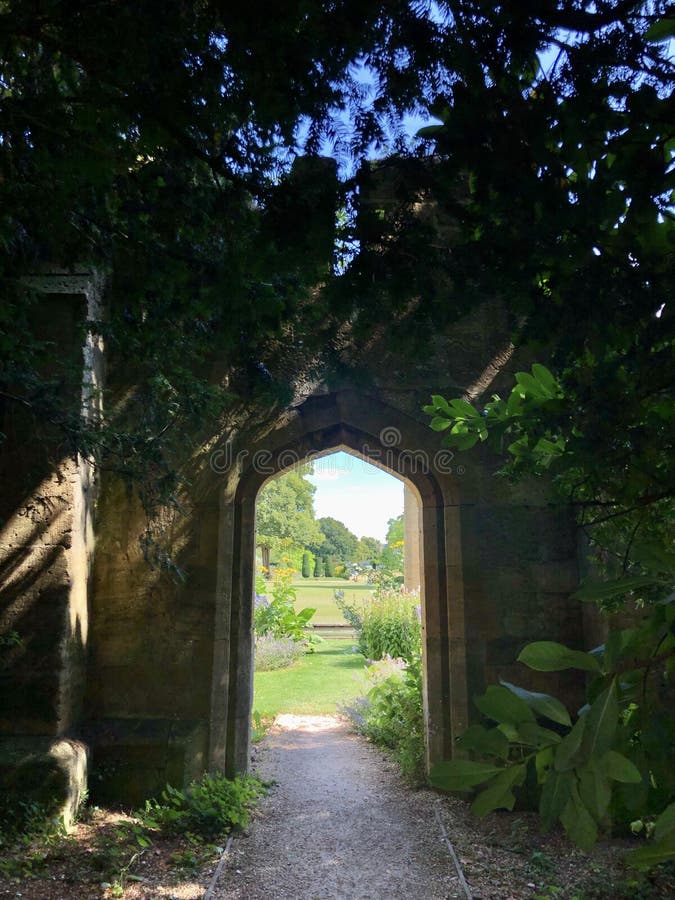 English Country Garden Secret Garden Through An Archway On Castle