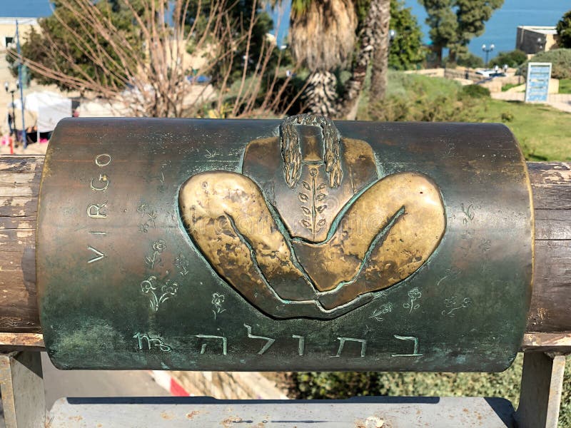 English and Hebrew virgo metal astrological sign on Wishing Bridge in Old City of Yaffa Israel stock photography English and Hebrew virgo metal astrological sign on Wishing Bridge in Old City of Yaffa Israel stock photography