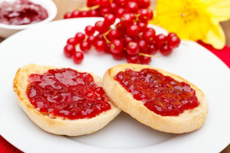 English muffins with jam stock image. Image of berries 33563037