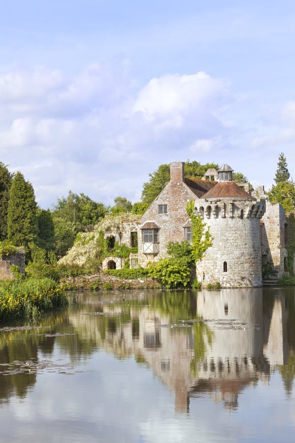 English romantic castle with reflections in water