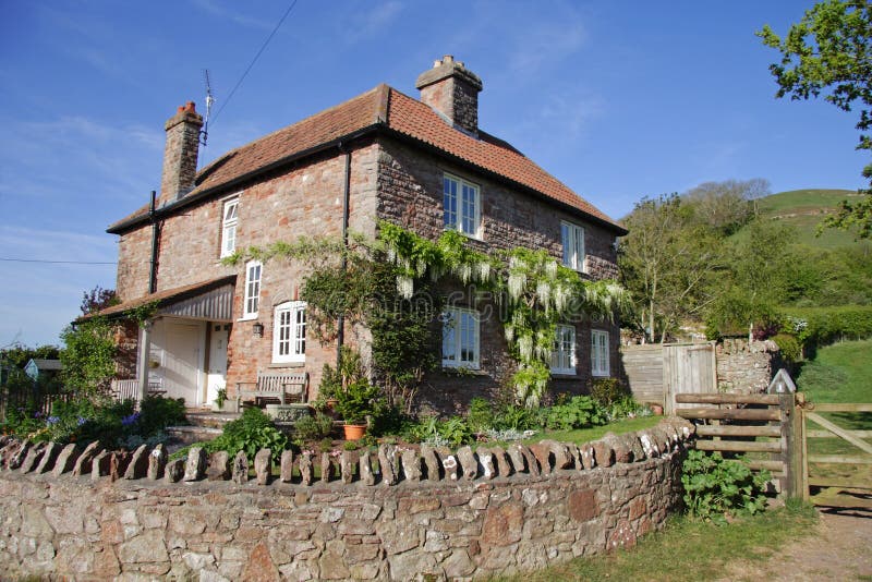 English Rural House and Garden with stone wall