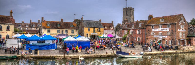 English town market Wareham Dorset with people and stalls situated on the River Frome near Poole in colourful HDR panoramic view