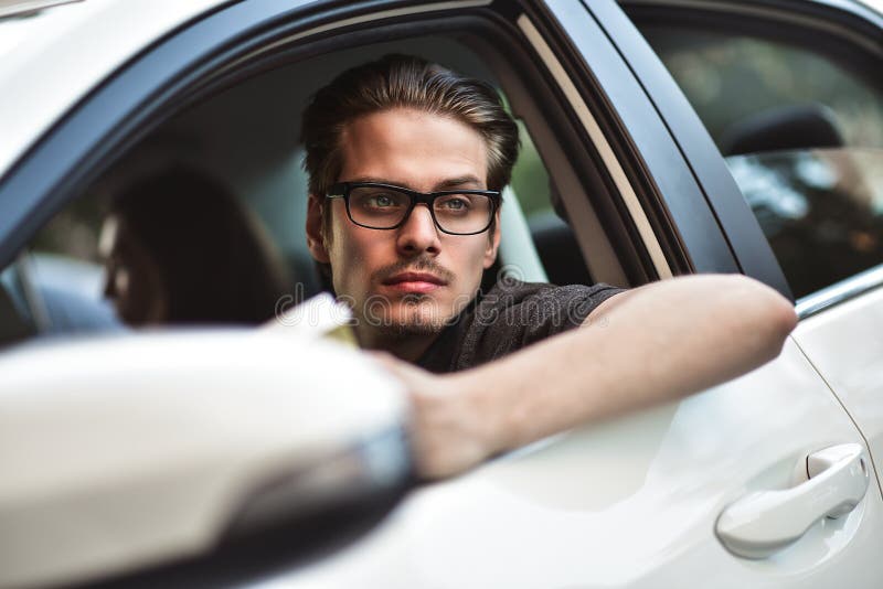 Close Up Side Portrait of Caucasian Man Driving Car. Stock Photo ...