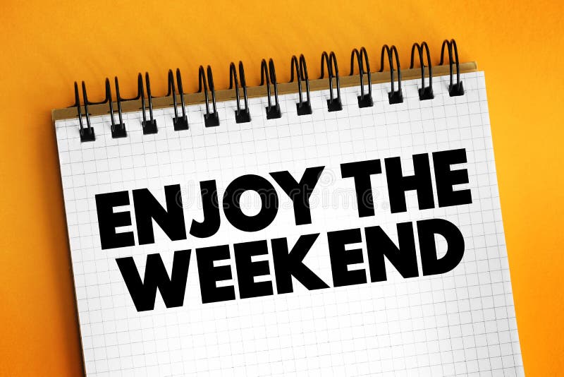 Enjoy the Weekend text on notepad, concept background stock images