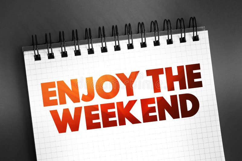 Enjoy the Weekend text quote on notepad, concept background stock photos