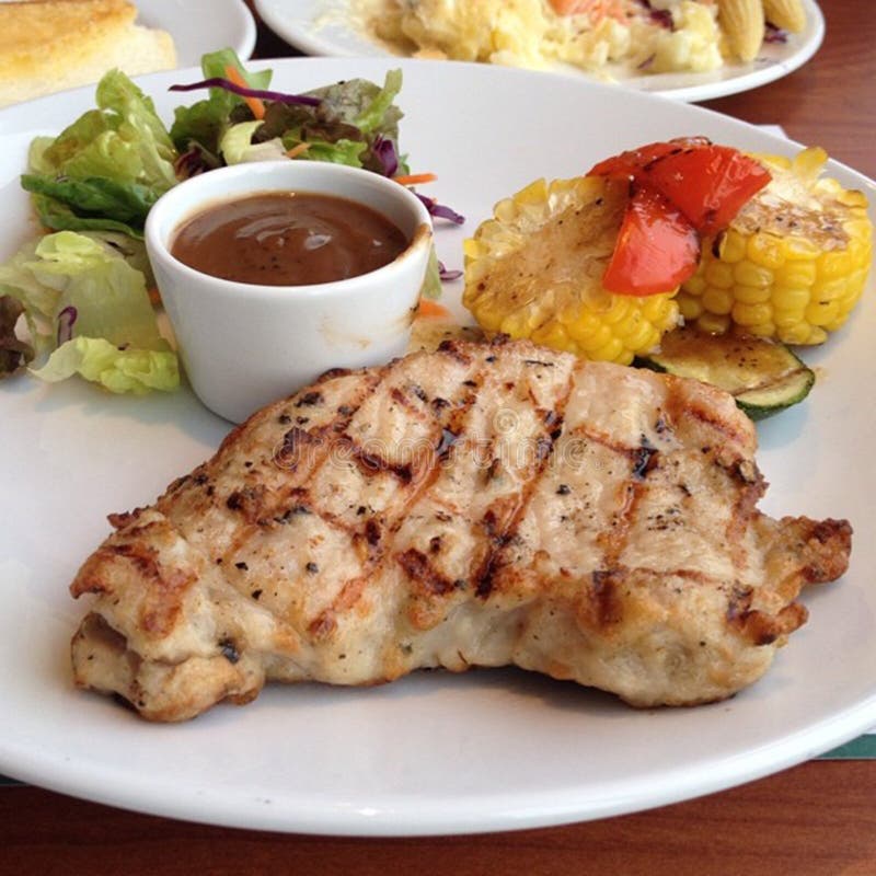 Enjoy your dinner! Top view of food and drinks on the rustic wooden table royalty free stock photography