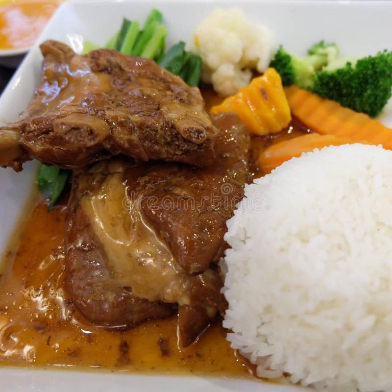 Enjoy your dinner! Top view of food and drinks on the rustic wooden table. royalty free stock image