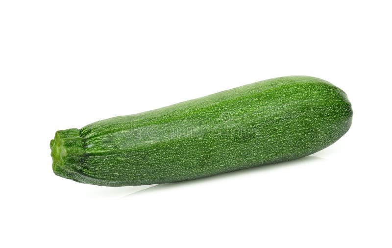 Enkel ny grön zucchini som isoleras på vit arkivfoto Enkel ny grön zucchini som isoleras på vit arkivfoto
