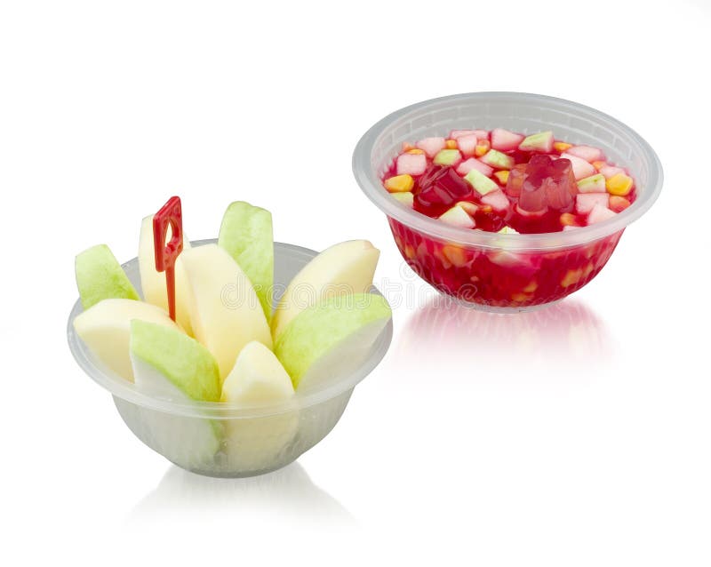 Ensalada de la fruta y de fruta de la jalea en el cuenco plástico en blanco imagen de archivo Ensalada de la fruta y de fruta de la jalea en el cuenco plástico en blanco imagen de archivo