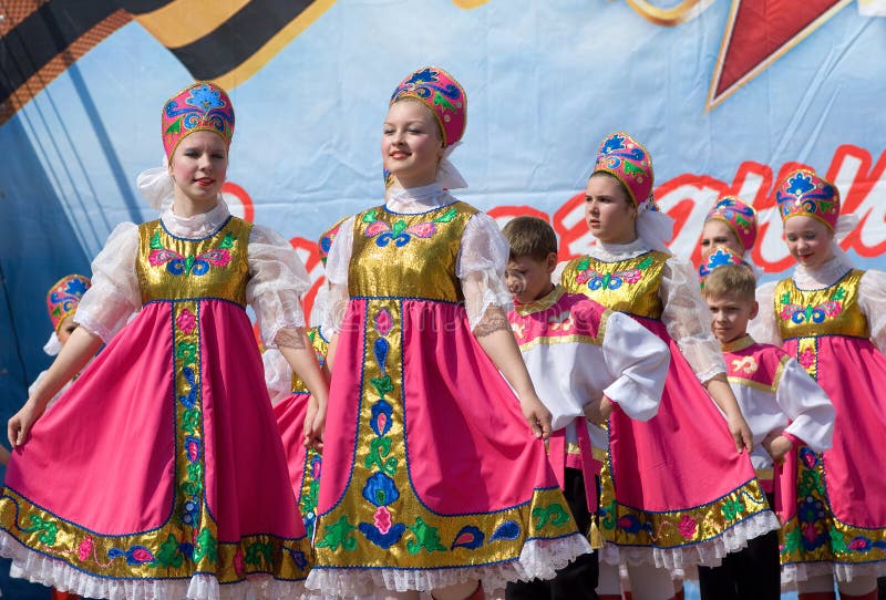 PODOLSK - MAY 9: Unidentified artists of ensemble of national dance Russia dancing at event dedicated to Victory Day in WWII on May 9, 2012 in Podolsk, Russia