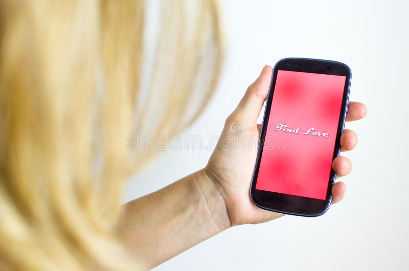 Entdeckungsliebe auf Internet-Handyflirt lizenzfreie stockbilder Entdeckungsliebe auf Internet-Handyflirt lizenzfreie stockbilder