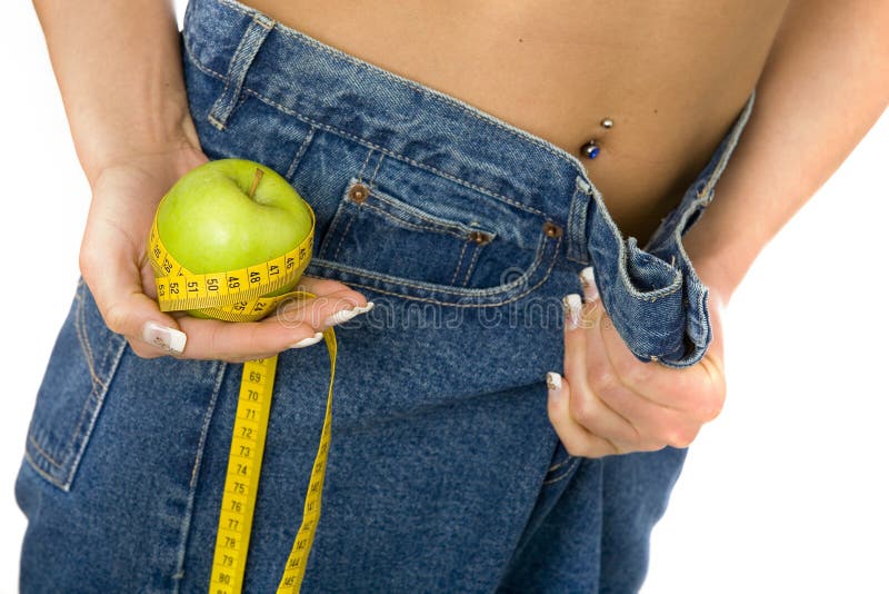 Ente esile del ` s della donna in jeans fotografie stock Ente esile del ` s della donna in jeans fotografie stock