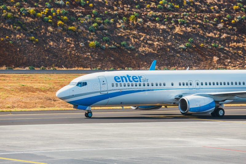 Enter Air Boeing 737 lands at Funchal Cristiano Ronaldo Airport. This airport is one of the most