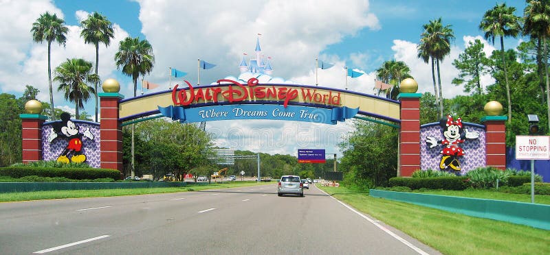Lake Buena Vista, Florida, USA - August 2015: an entrance of Walt Disney World Resort. Some cars are visible. Walt Disney World is the most visited vacation resort in the world, with an attendance of over 52 million annually. Lake Buena Vista, Florida, USA - August 2015: an entrance of Walt Disney World Resort. Some cars are visible. Walt Disney World is the most visited vacation resort in the world, with an attendance of over 52 million annually.