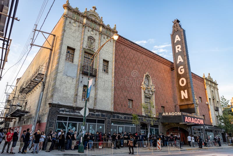 Entrance of the Aragon Ballroom with people in line to enter.