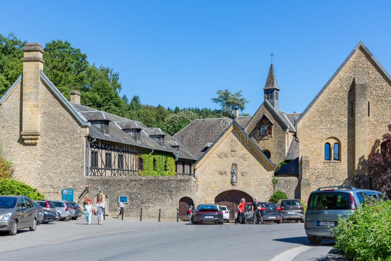 ORVAL, BELGIUM - AUGUST 23, 2016: Entrance famous Orval Abbey in Belgian Ardennes. The abbey is famous for its trappist beer, botanical garden and ruins