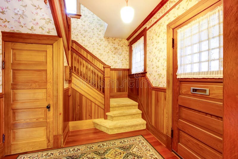 Entrance hallway with staircase and beige carpet covered steps royalty free stock photo Entrance hallway with staircase and beige carpet covered steps royalty free stock photo