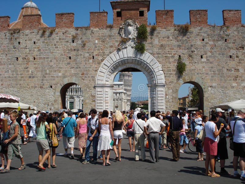 Entrance of the Piazza del duomo with the cathedral, Baptistery an the tower of Pisa